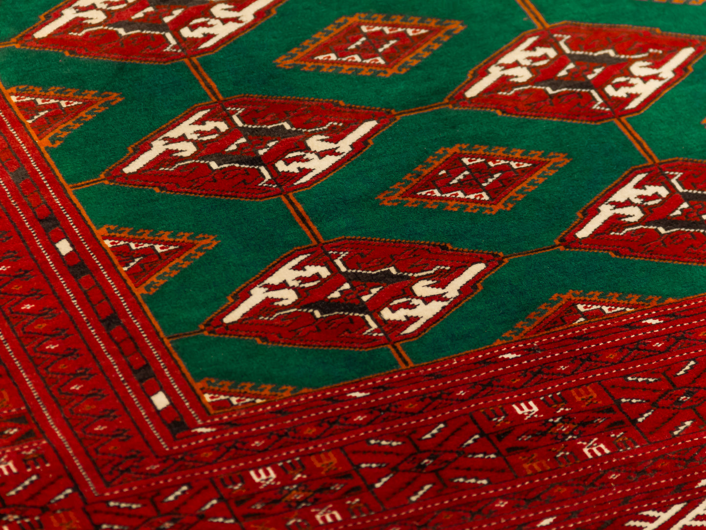 Handmade Traditional Fine Red And Green Bokhara Persian Wool Rug product image #29971684229290