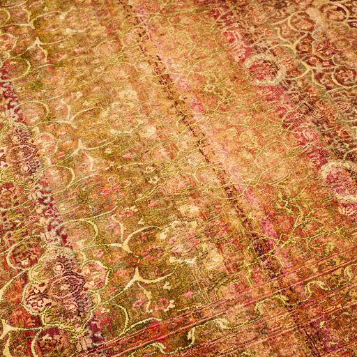 Indian Wool And Silk Rug With An Antique Design