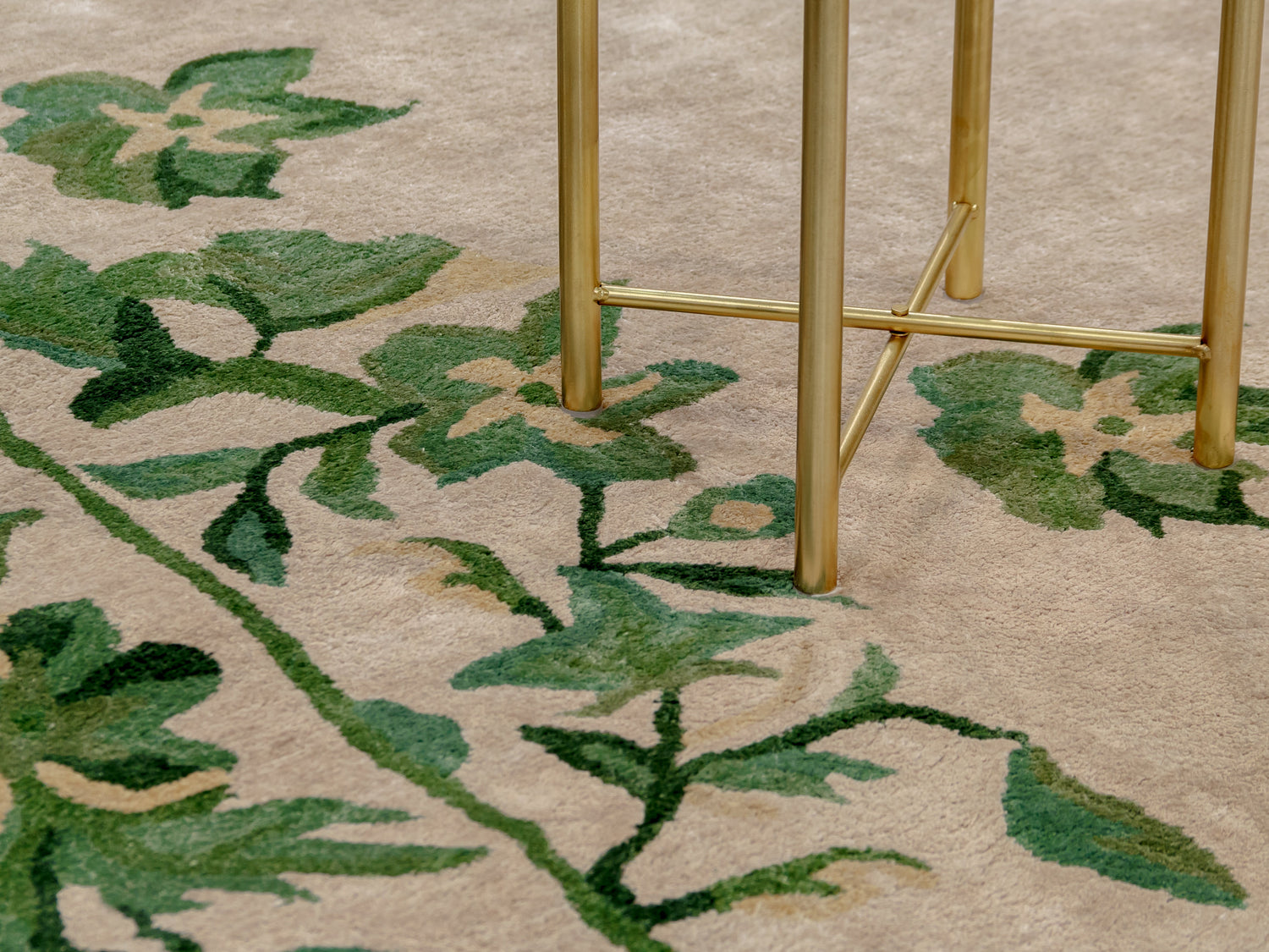green leaf on a wool rug