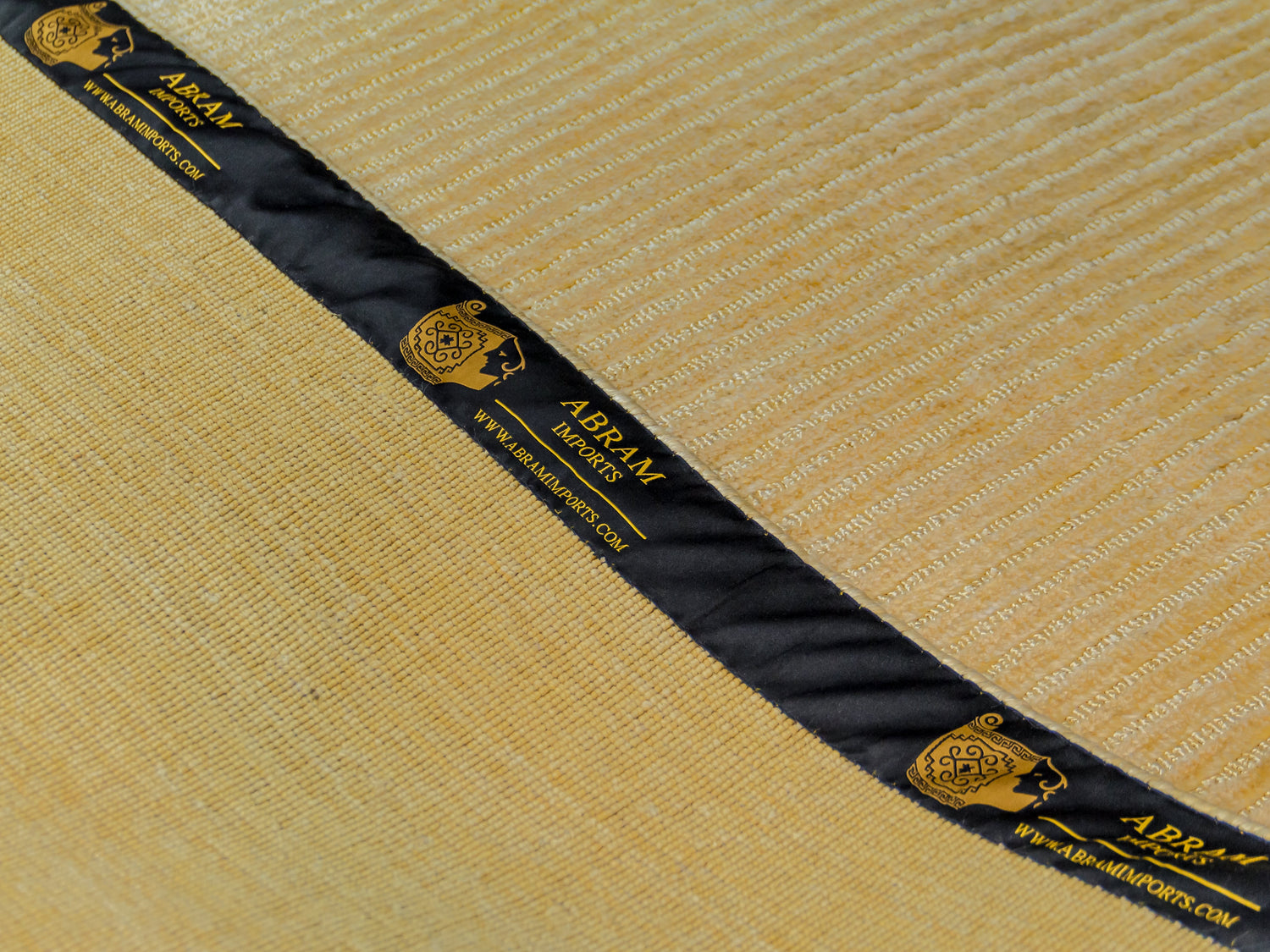 Abram imports logo on a rug
